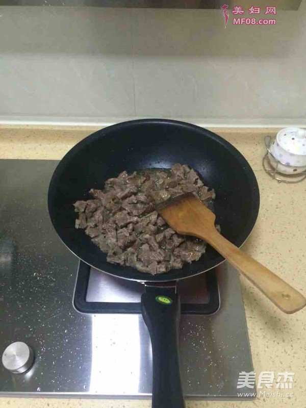 ţ