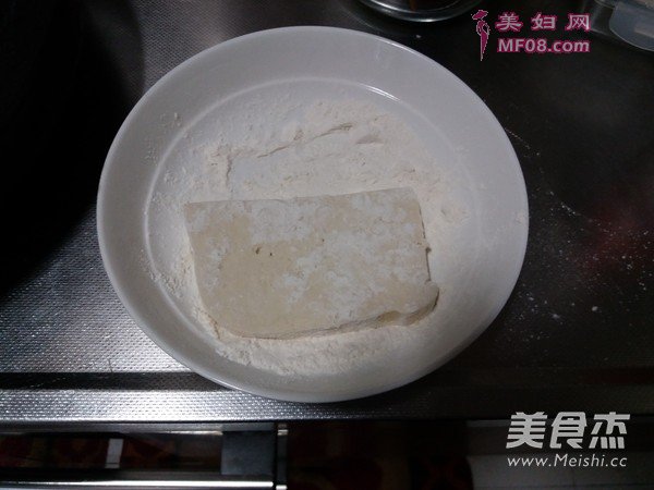綹