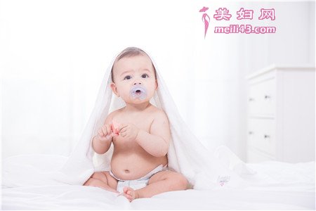 ţ